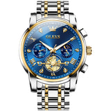 Luxury watch with blue face and gold accents on a white background