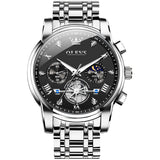 Silver watch with black dial on a white background