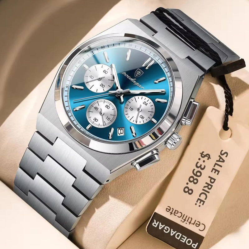 Silver watch with blue face on a beige surface with a price tag.