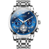 Silver watch with blue face and visible brand name on a white background