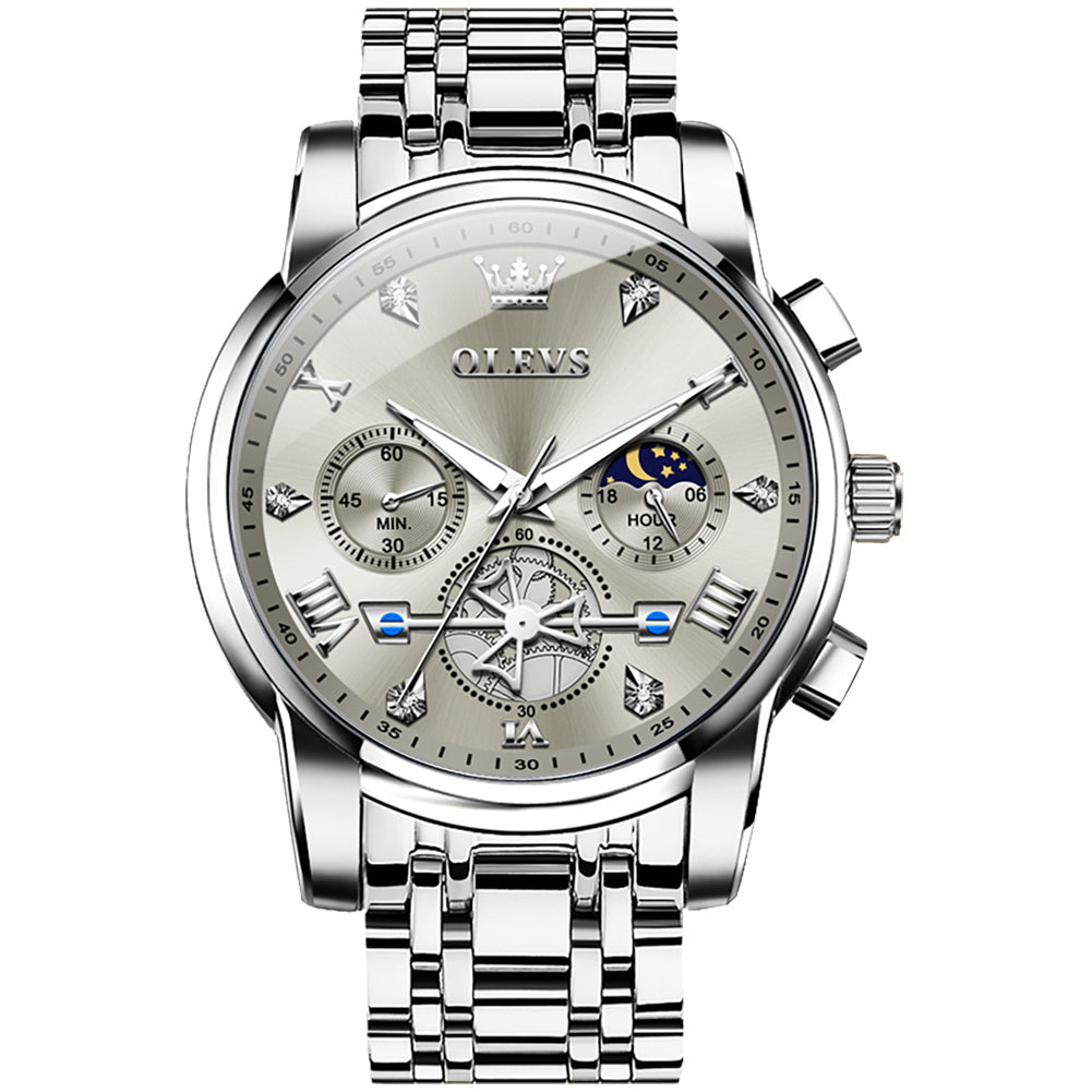 Silver watch with detailed face on a white background